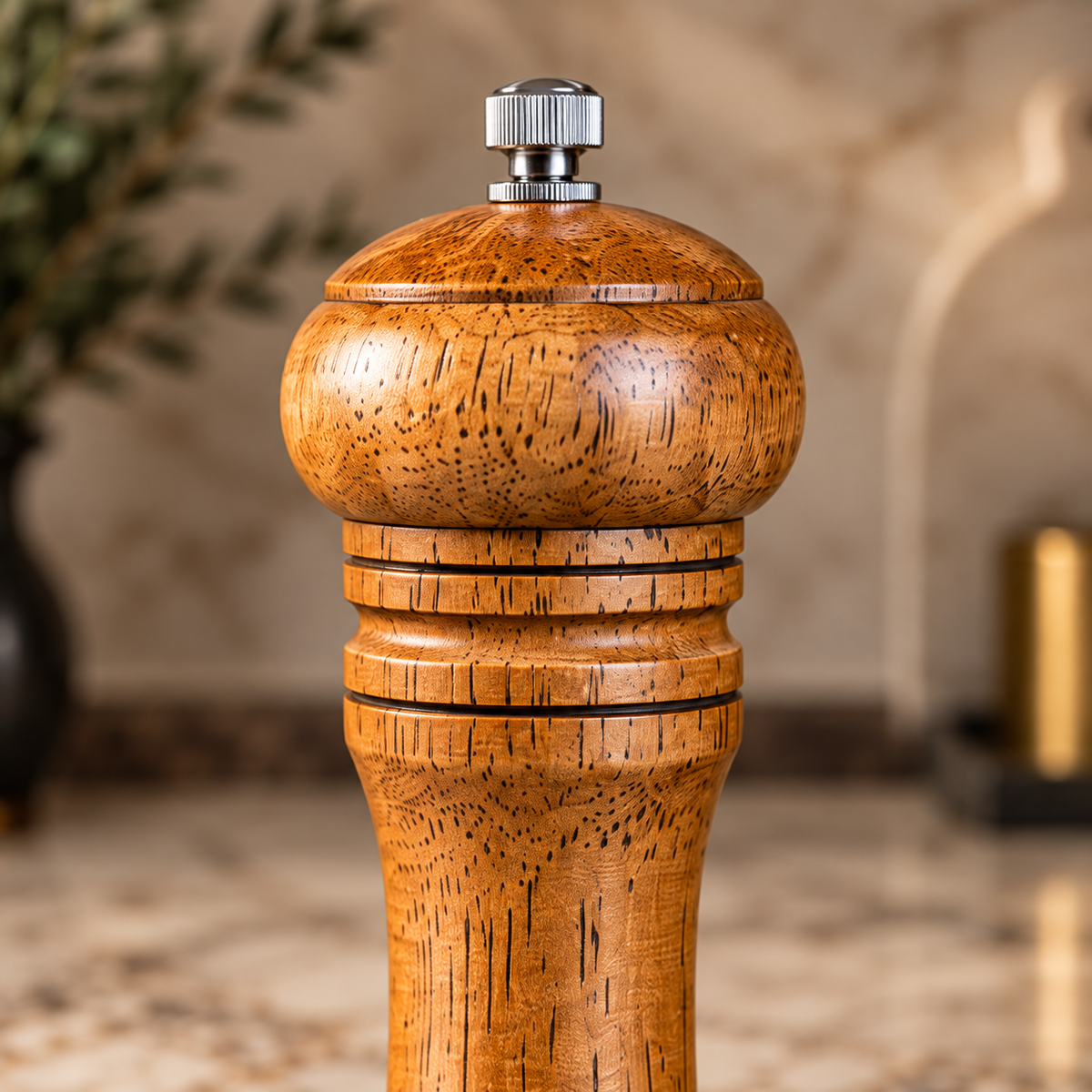 Classic 15cm wooden pepper grinder in honey-brown finish with curved design and silver adjustment knob.