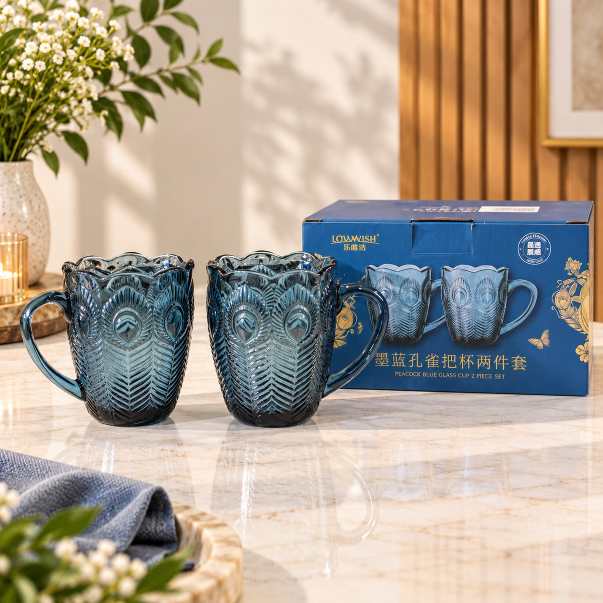Dark blue peacock glass cup 2-piece set with embossed feather pattern, scalloped rims and curved handles