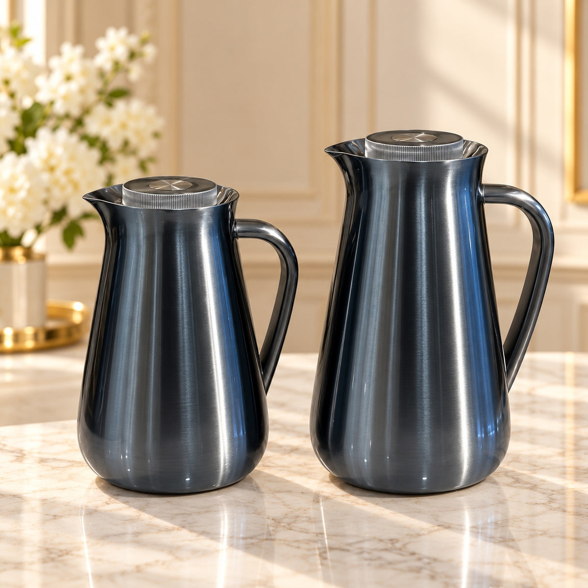Najib luxury blue grey vacuum flask set 2 pieces 1L and 0.5L with metallic finish, curved handles and silver-tone lids for Arabic coffee and tea serving.