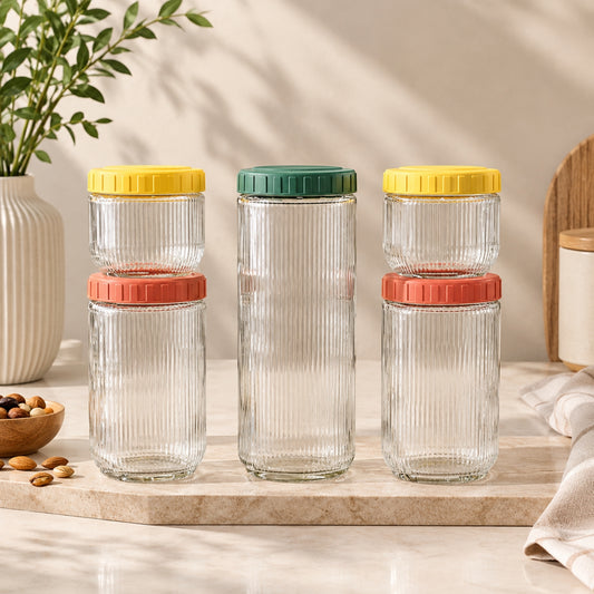 Cat's Claw 5 piece vertical ribbed clear glass storage jar set with yellow green and coral lids